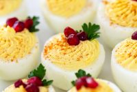 Christmas Deviled Eggs with Cranberries and Chives
