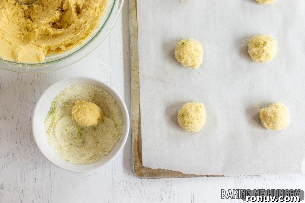 Zesty Lime Sugar Cookies with Citrus Glaze 9 cookie dough being rolled in sugar and zest mixture