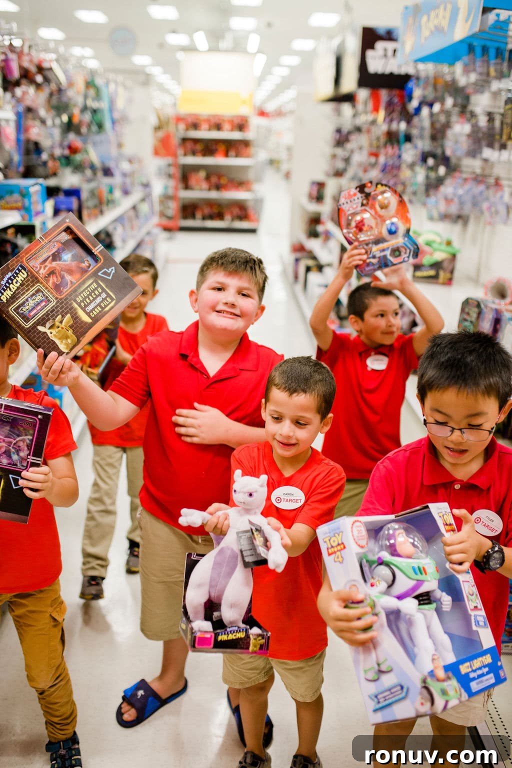 Target-Themed Birthday Party Ideas and Decor 14 kids holding toys