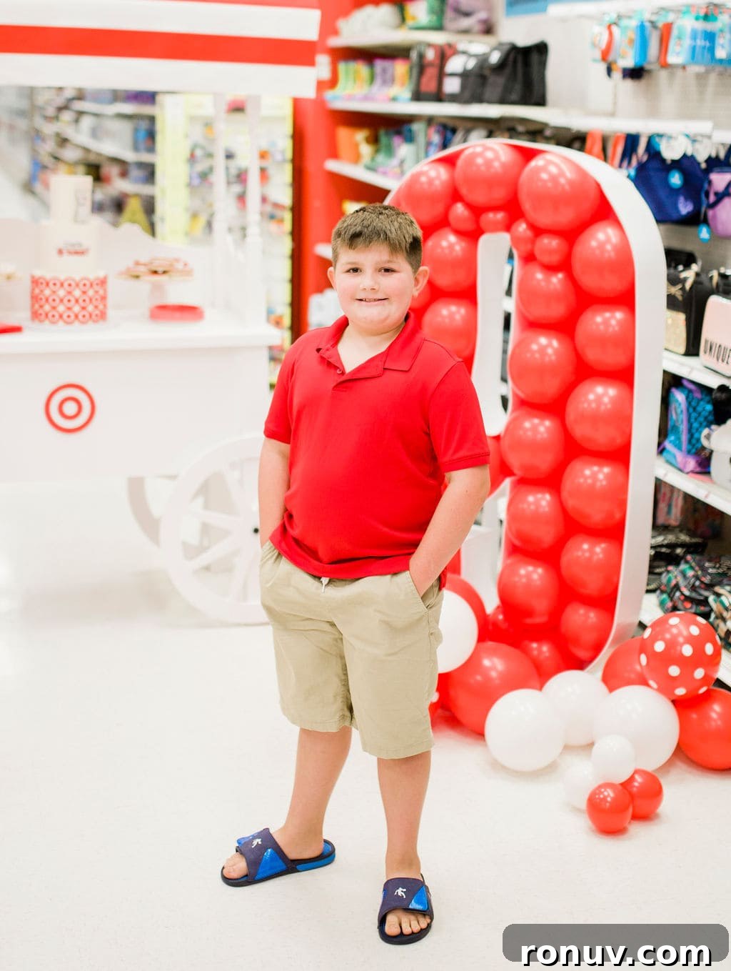 Target-Themed Birthday Party Ideas and Decor 30 kids standing in front of balloons