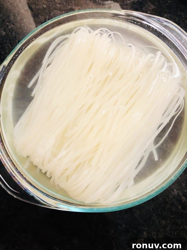Slow Cooker Hoisin Peanut Noodles Recipe 7 rice noodles soaking in water
