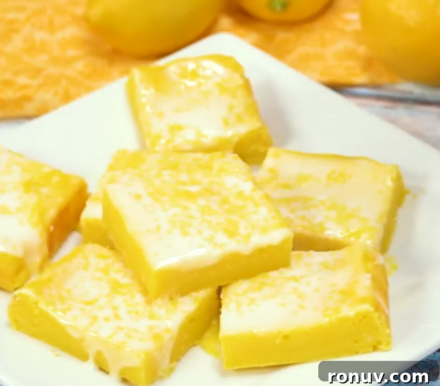 Lemon Cream Cheese Brownies Recipe with Tangy Swirl 10 Bright lemon brownies on a serving board