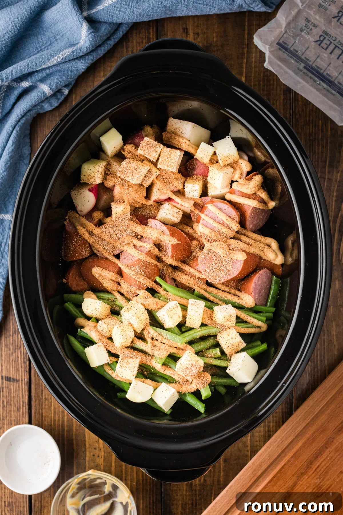 Slow Cooker Kielbasa Dinner Recipe with Potatoes 6 Ingredients for kielbasa dinner in a slow cooker.