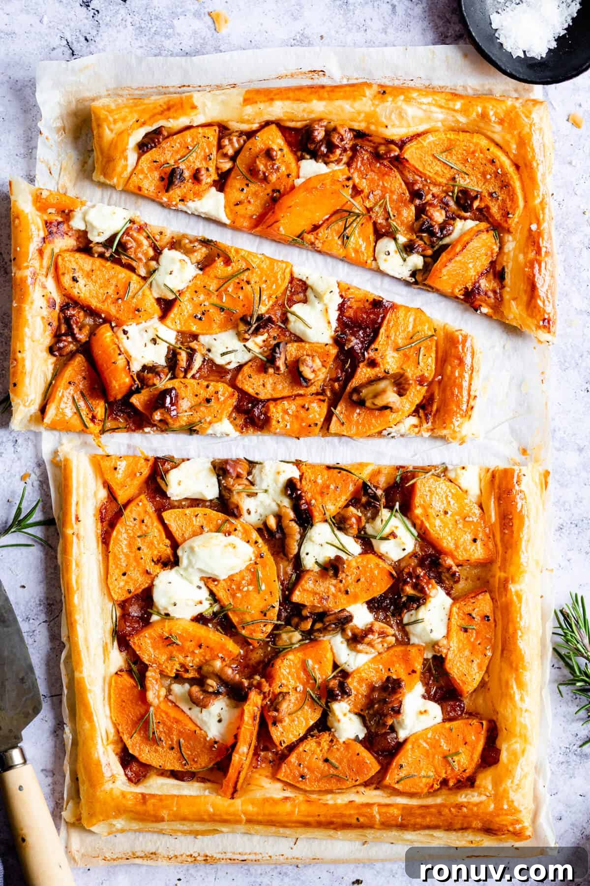 Roasted Butternut Squash and Goat Cheese Tart 2 close up top view of sliced butternut squash tart