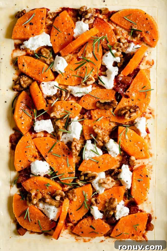 Roasted Butternut Squash and Goat Cheese Tart 4 close up of butternut squash tart with goats' cheese and rosemary