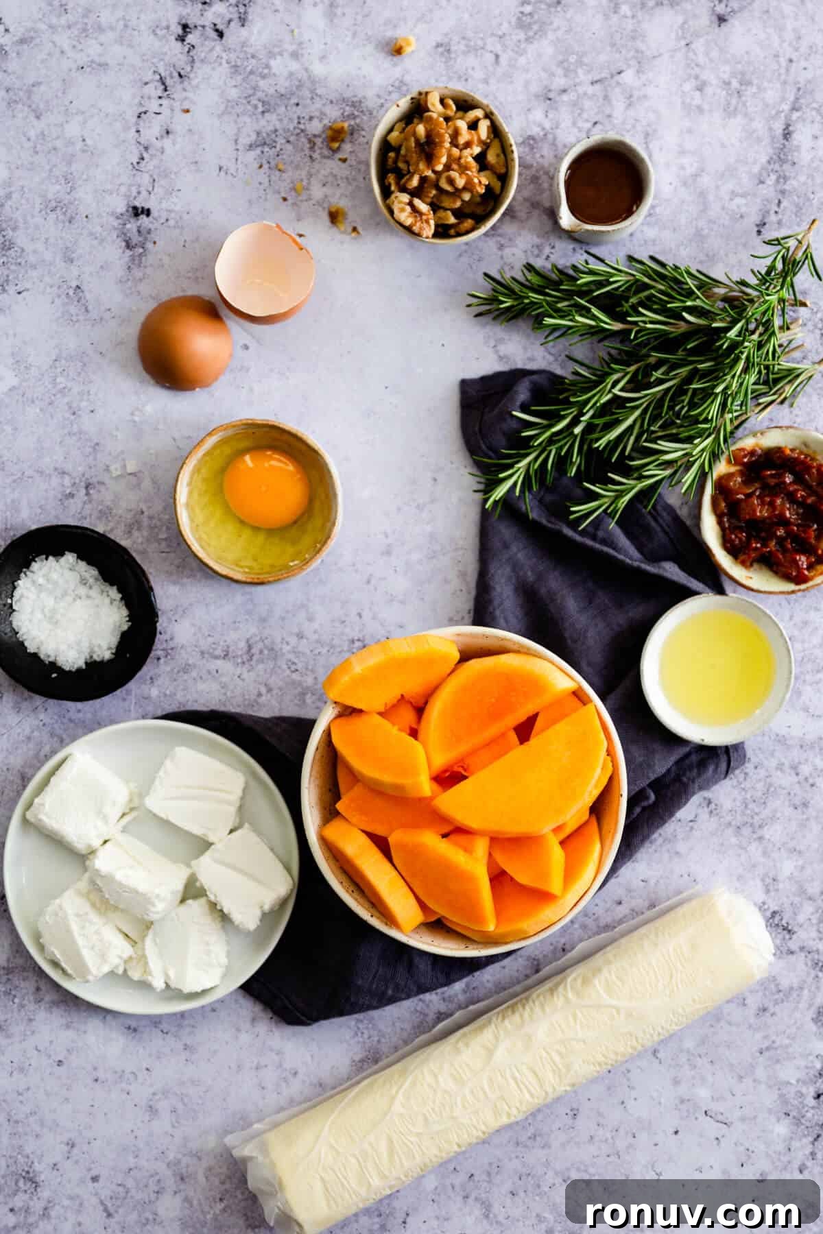 Roasted Butternut Squash and Goat Cheese Tart 5 overhead view of bowls with ingredients for butternut squash tart