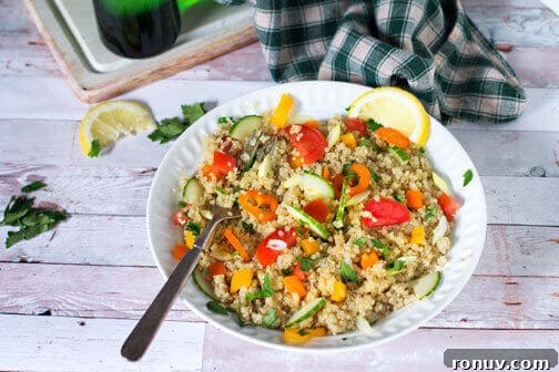 Greek Quinoa Salad with Feta, Cucumber and Olives 3 A bowl of quinoa salad