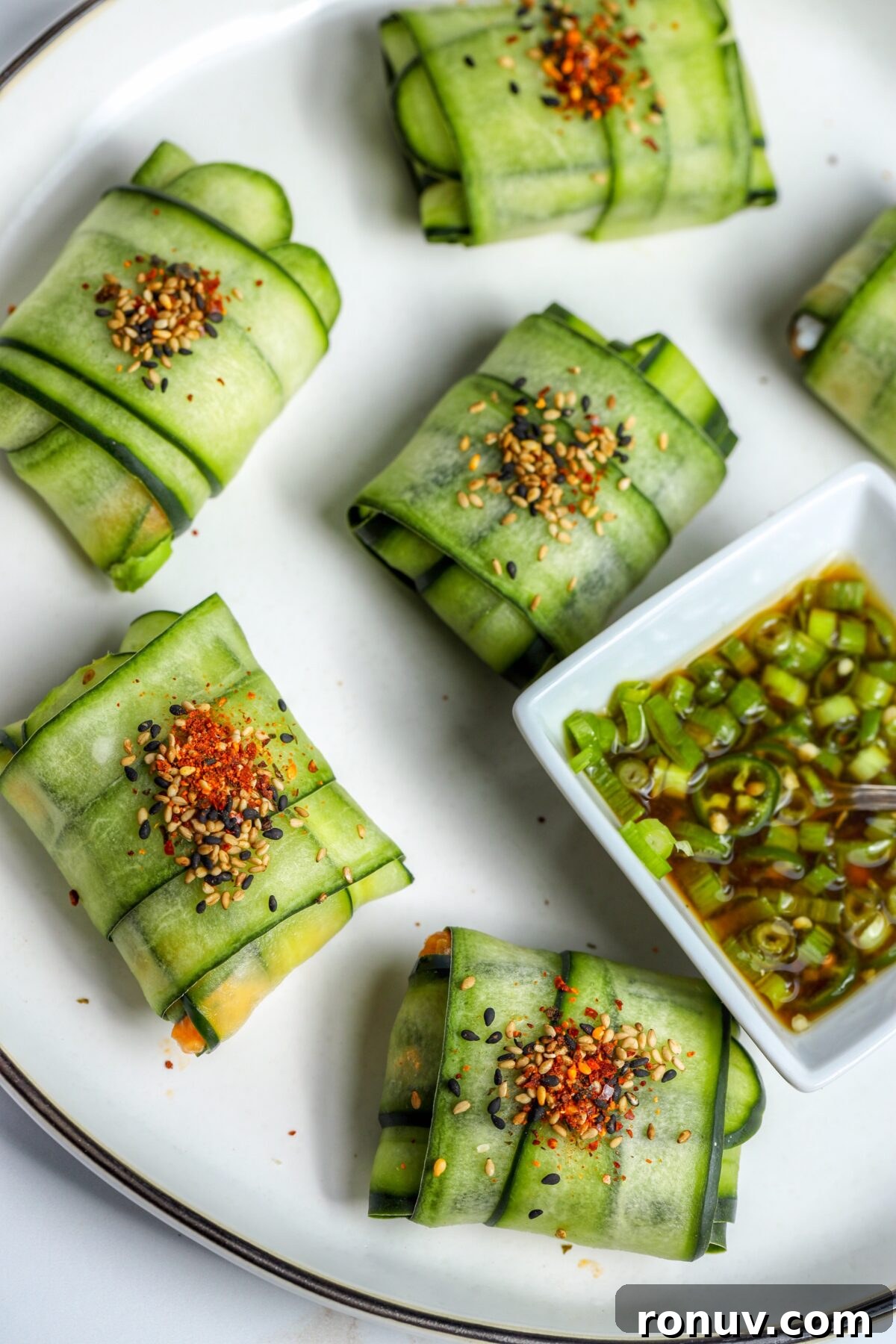 Cucumber and Salmon Appetizer Bites 3 spicy salmon cucumber envelopes
