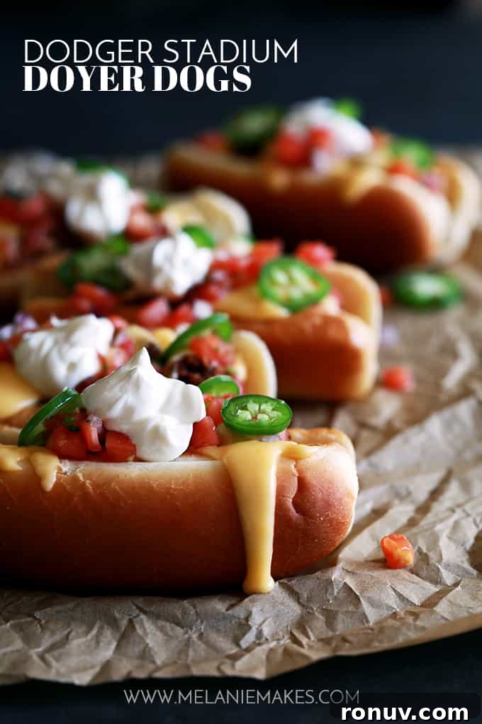 Dodger Stadium Doyer Dogs My Dodger Stadium Doyer Dogs are like bringing the ballpark home, but with a more flavorful punch! This hot dog is nestled in a pillowy bun before being covered with my Beer Braised Beanless Chili, Beer Cheese Fondue, pico de gallo, sour cream and sliced jalapeños.