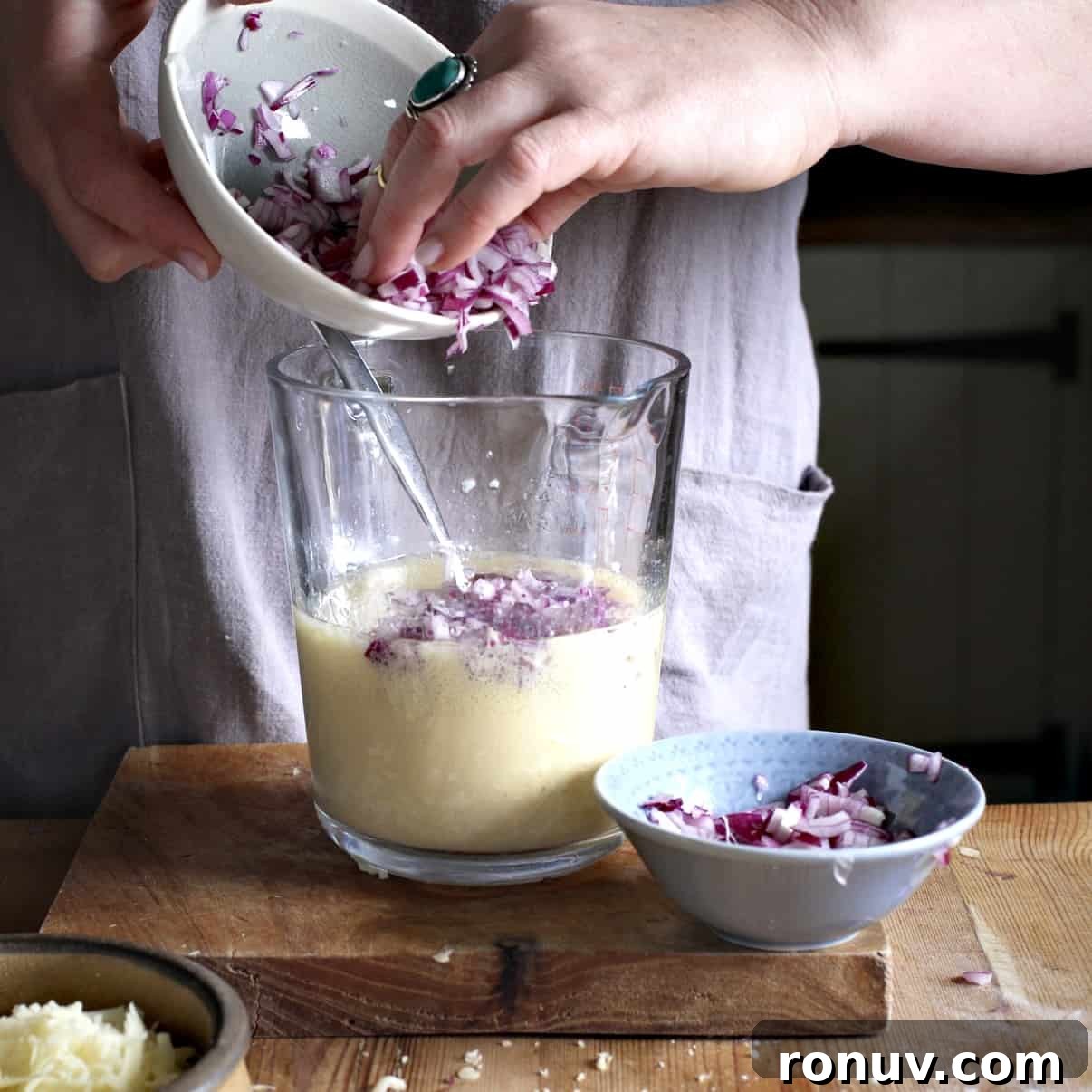 Savory Cheese and Red Onion Muffins: Budget-Friendly Snack 9 Adding chopped red onion to batter