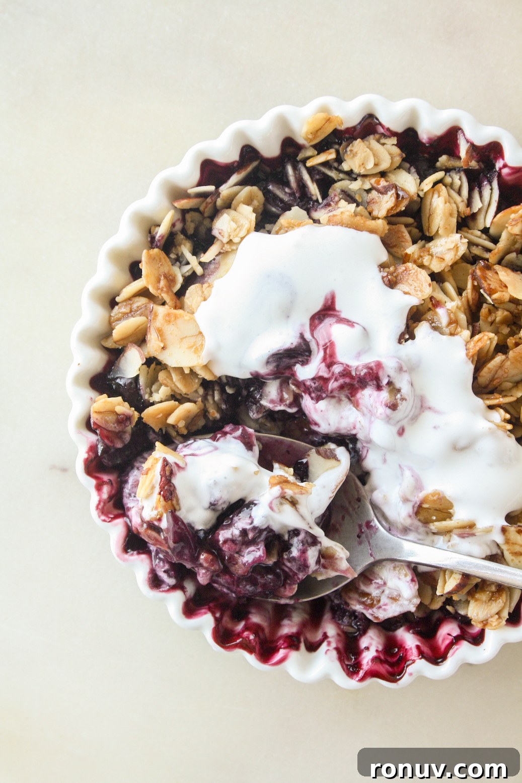 Blueberry Crisp Recipe with Crunchy Oat Topping 4 Naturally sweetened blueberry crisp with an oat and honey topping. Vegan and gluten-free.