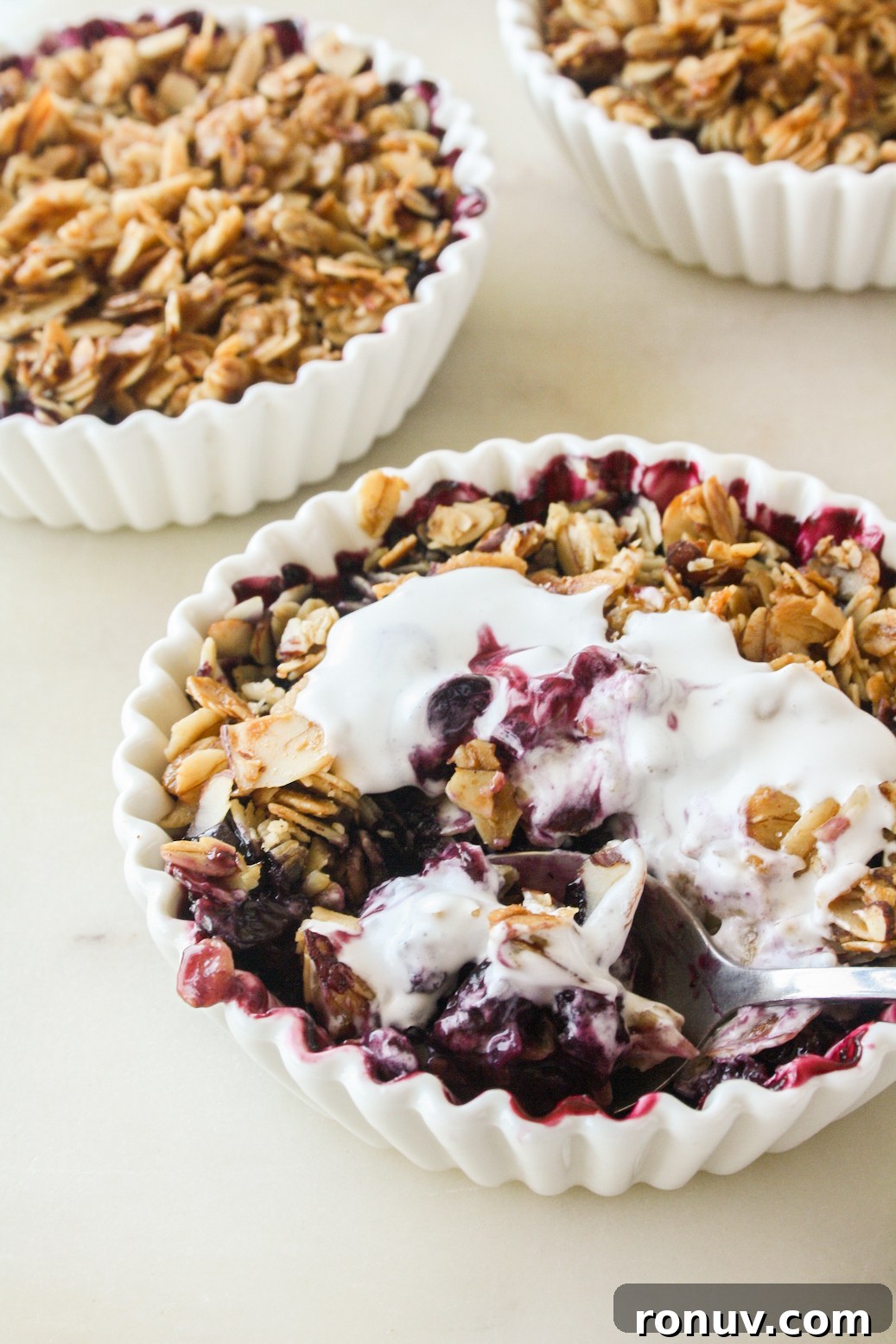Blueberry Crisp Recipe with Crunchy Oat Topping 6 Naturally sweetened blueberry crisp with an oat and honey topping. Vegan and gluten-free.