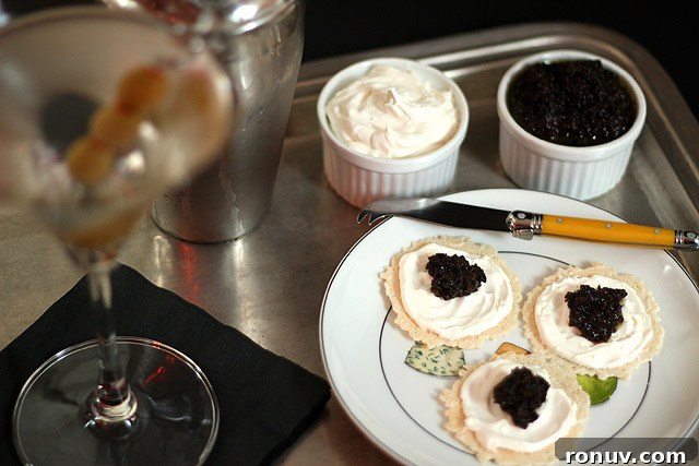 martini-olive-spread Crackers with cream cheese and olive tapenade