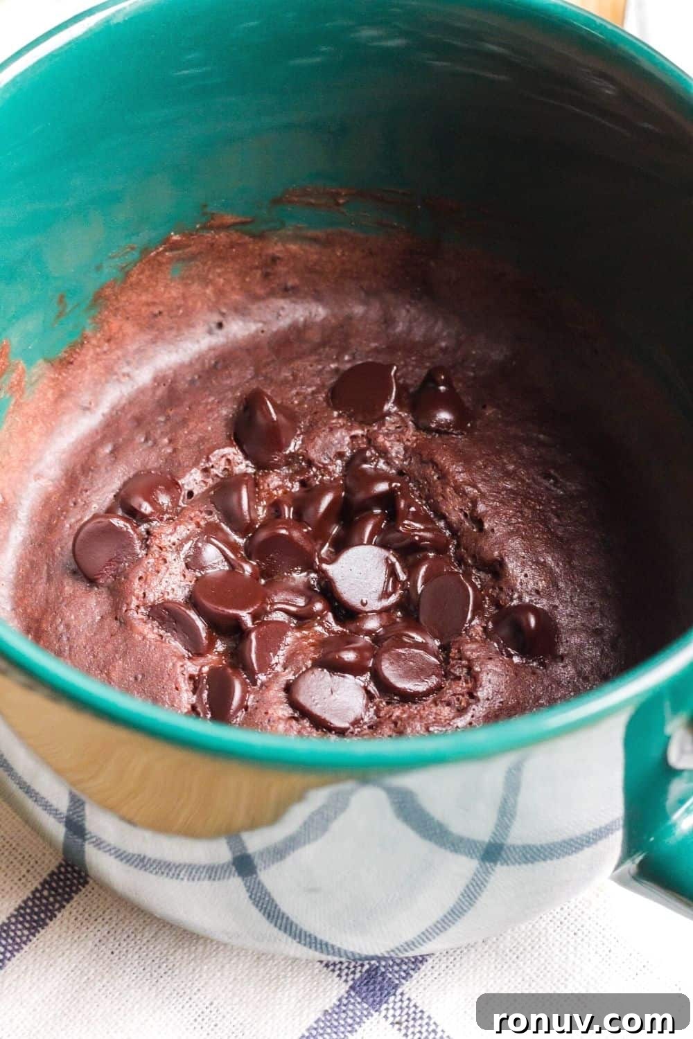 Instant Pot Single-Serve Chocolate Mug Cake 4 Freshly baked chocolate mug cake topped with chocolate chips