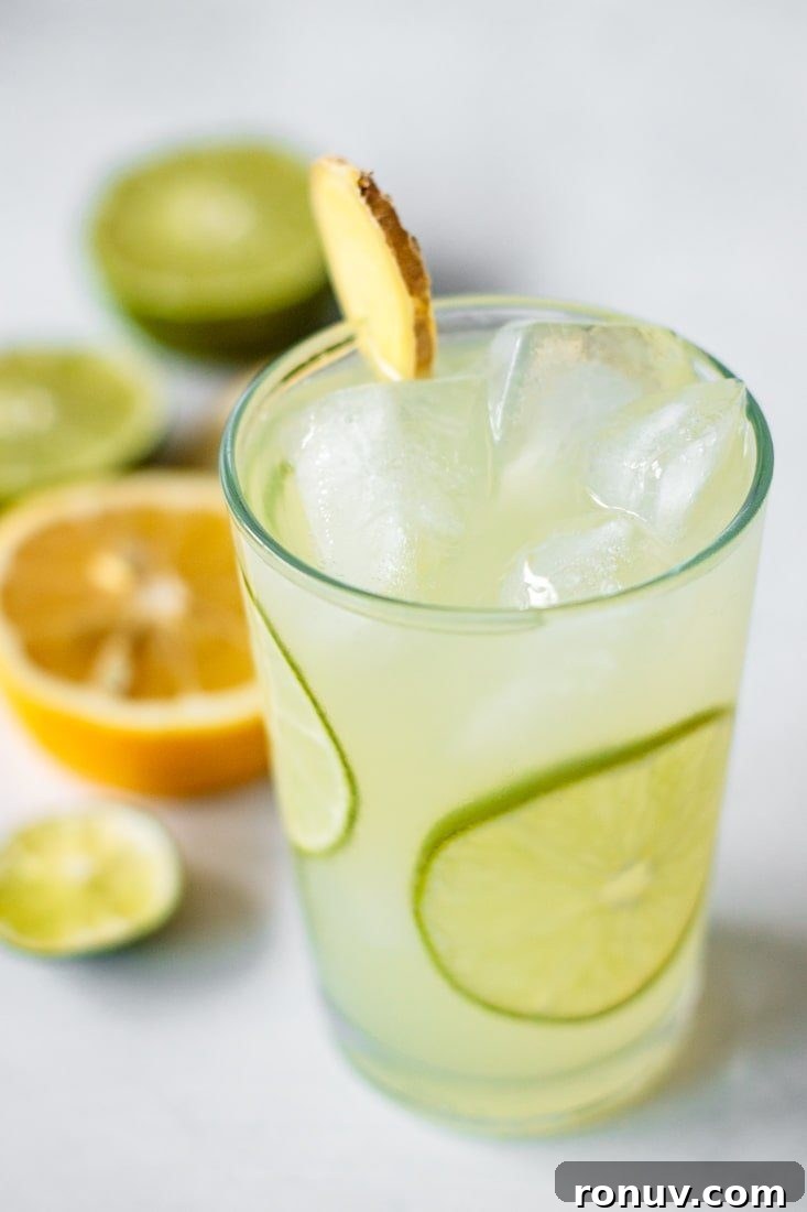 Iced Ginger Tea with Honey Recipe 4 Drink with slices of lime and ginger.