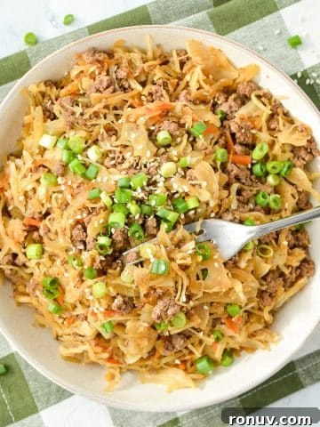 Creamy Boursin Spaghetti Squash Recipe 8 A bowl filled with cabbage and ground beef stir fry.