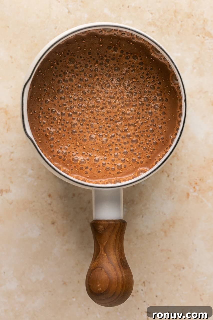 bone broth hot chocolate in a sauce pan