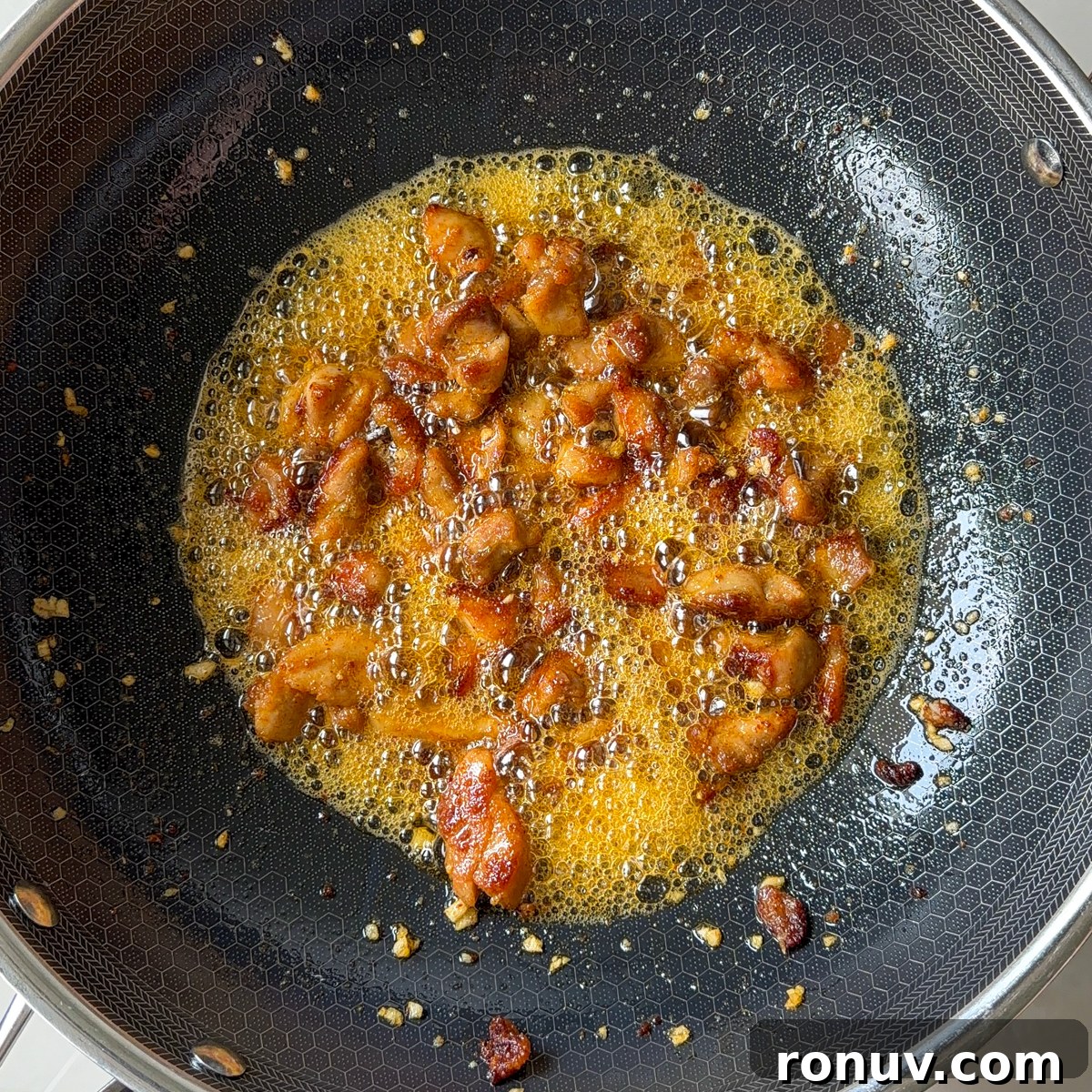 Saute the minced garlic in butter & add in the chicken!