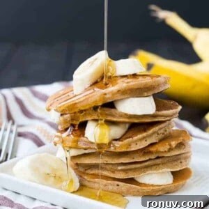 These easy and healthy banana pancakes taste just like banana bread in a whole wheat pancake form! They freeze well and will make mornings delicious!