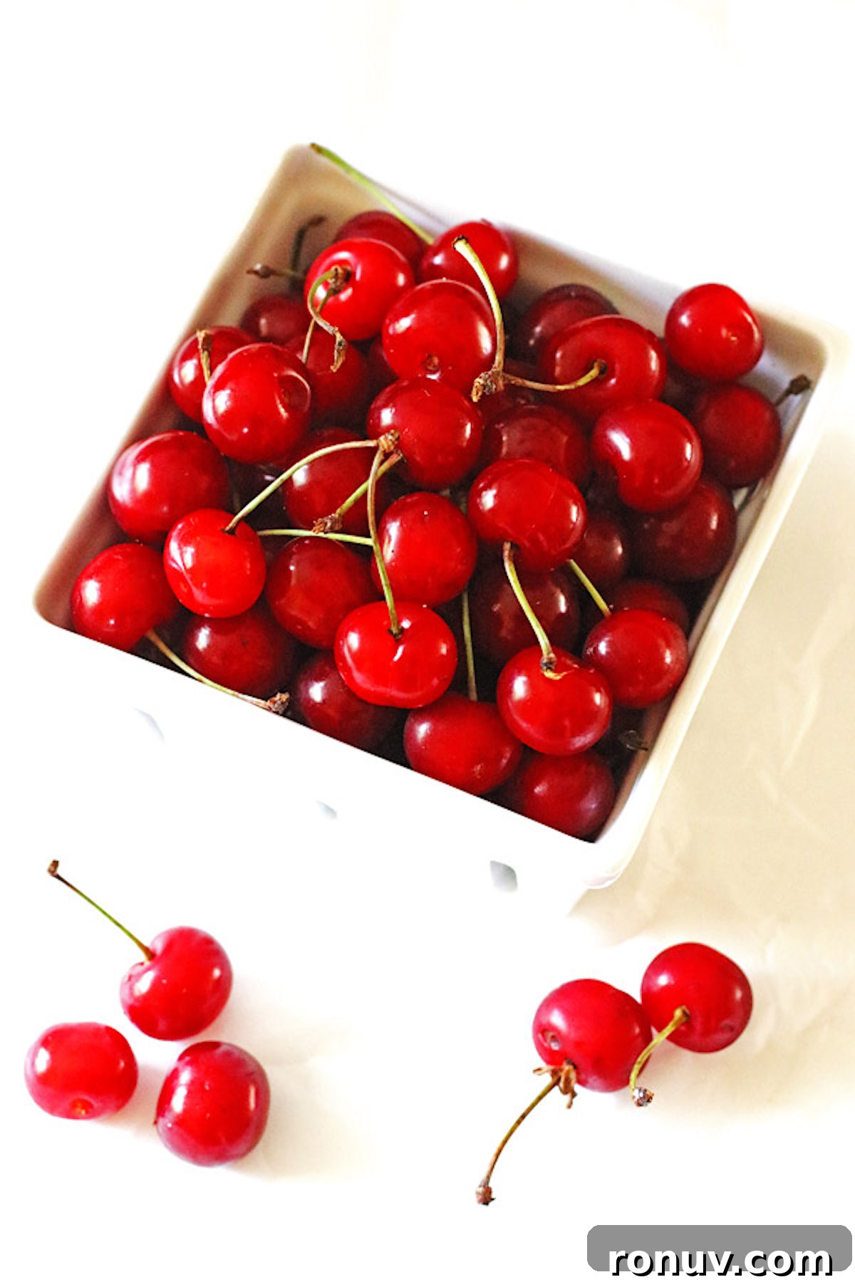 Tart cherries in a white quart basket