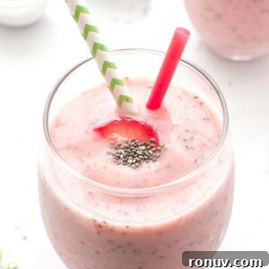 Creamy Vegan Gluten-Free Strawberry Chia Smoothie Recipe 2 Strawberry Chia Seed Smoothie (V+GF): A cool, refreshing and super thick strawberry smoothie that tastes just like a strawberry fruit popsicle! BEAMINGBAKER.COM #Vegan #GlutenFree