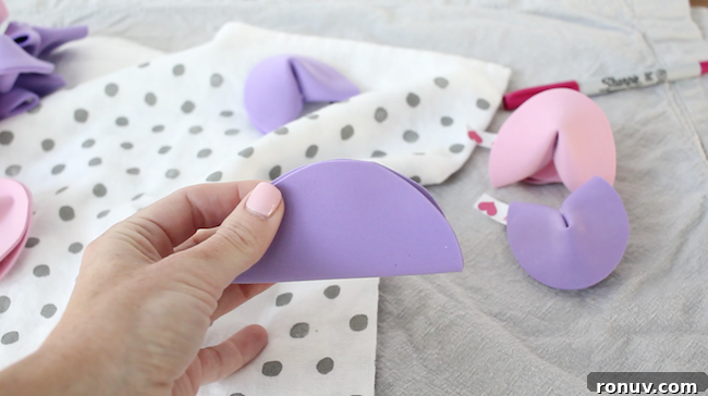 DIY Valentine's Fortune Cookies with Personalized Love Notes 6 Glue half of the circle and fold