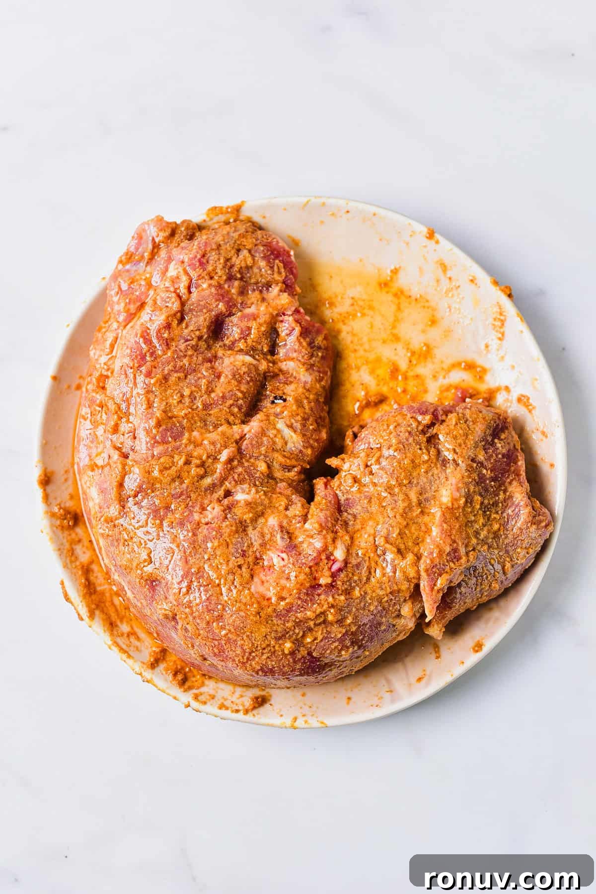 Juicy Marinated Grilled Pork Tenderloin Recipe 5 Raw pork with marinade.