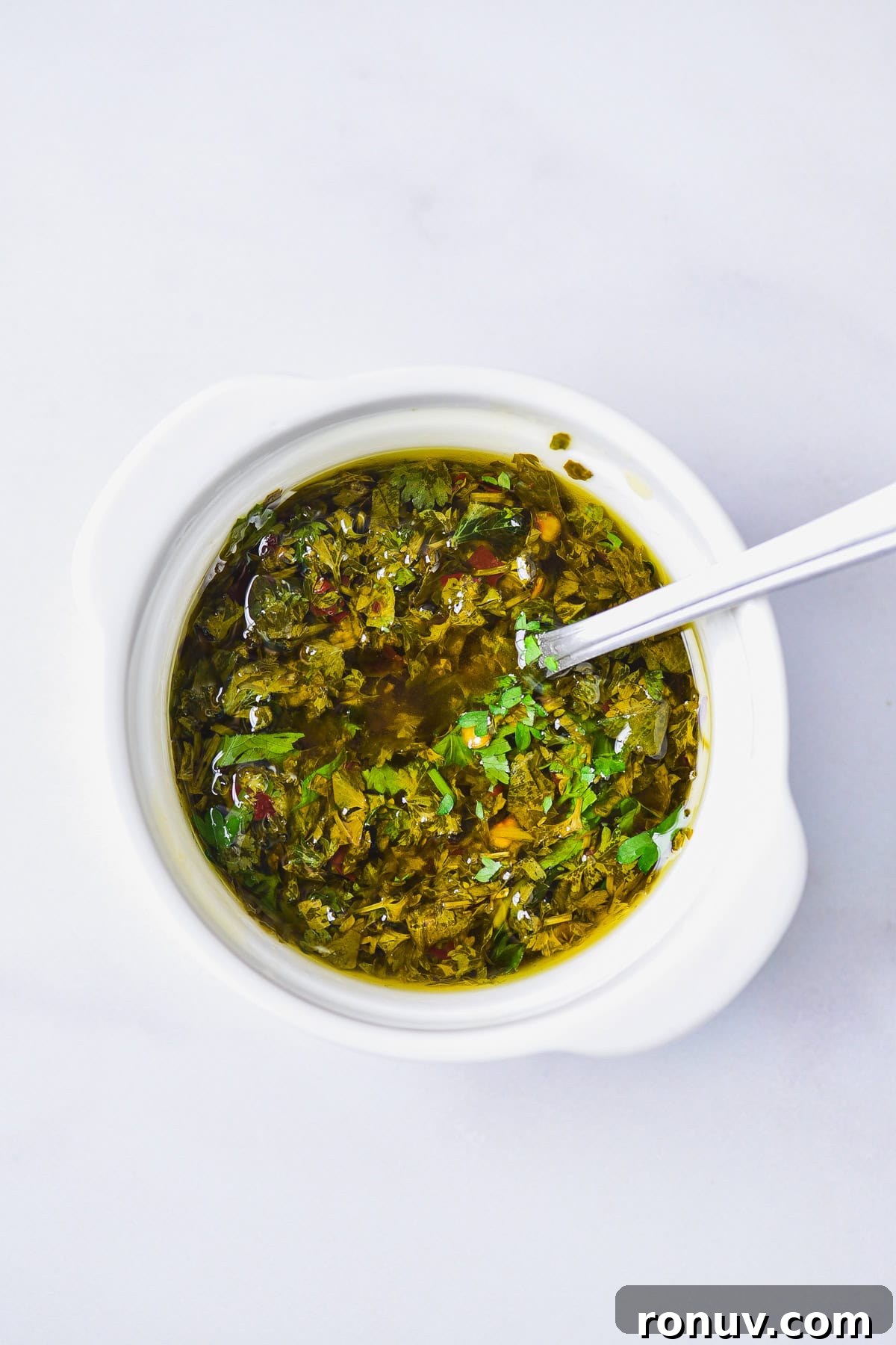 Juicy Marinated Grilled Pork Tenderloin Recipe 8 A small bowl of the chile herb sauce.