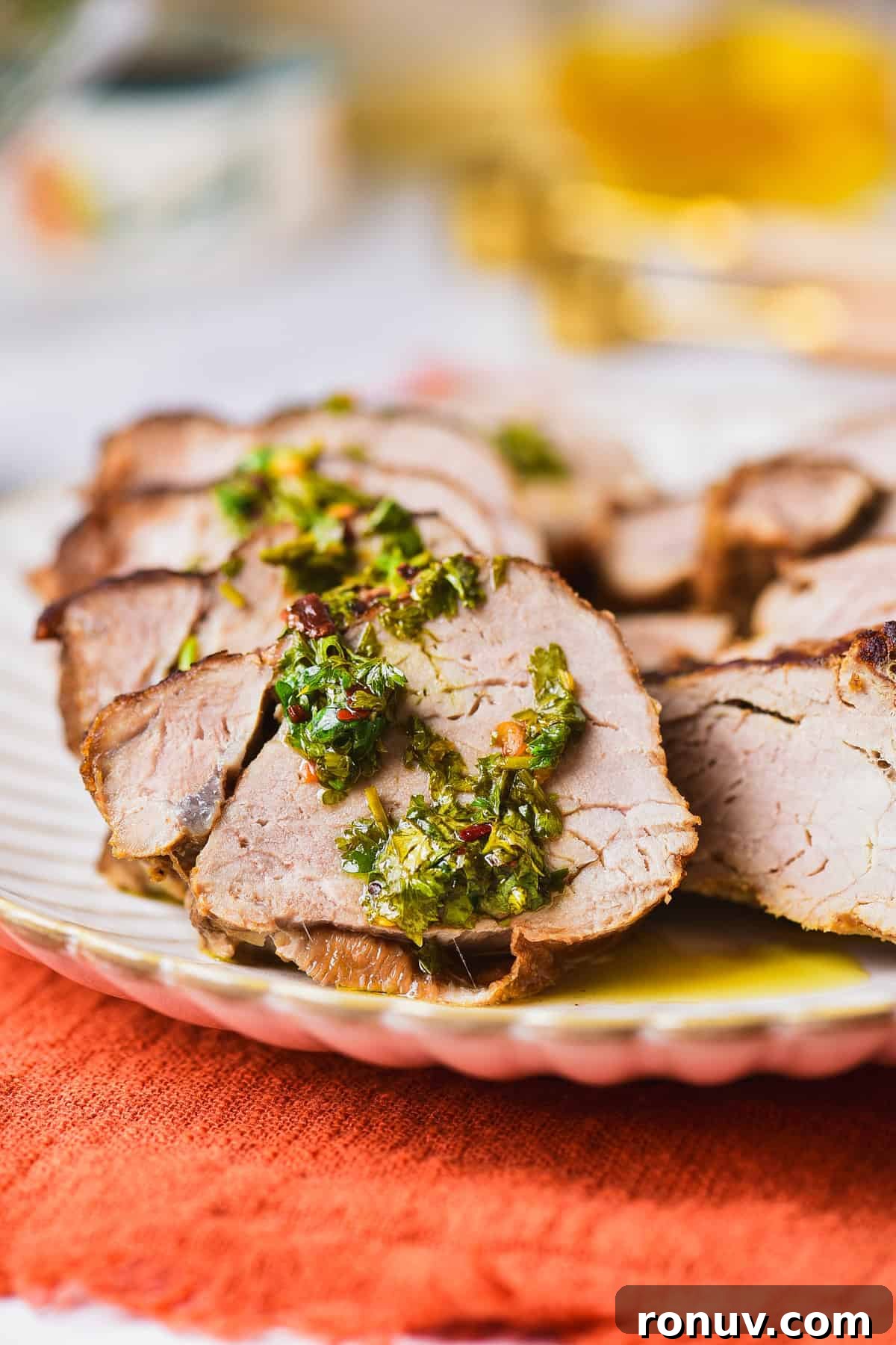 Juicy Marinated Grilled Pork Tenderloin Recipe 9 A plate of grilled pork tenderloin.