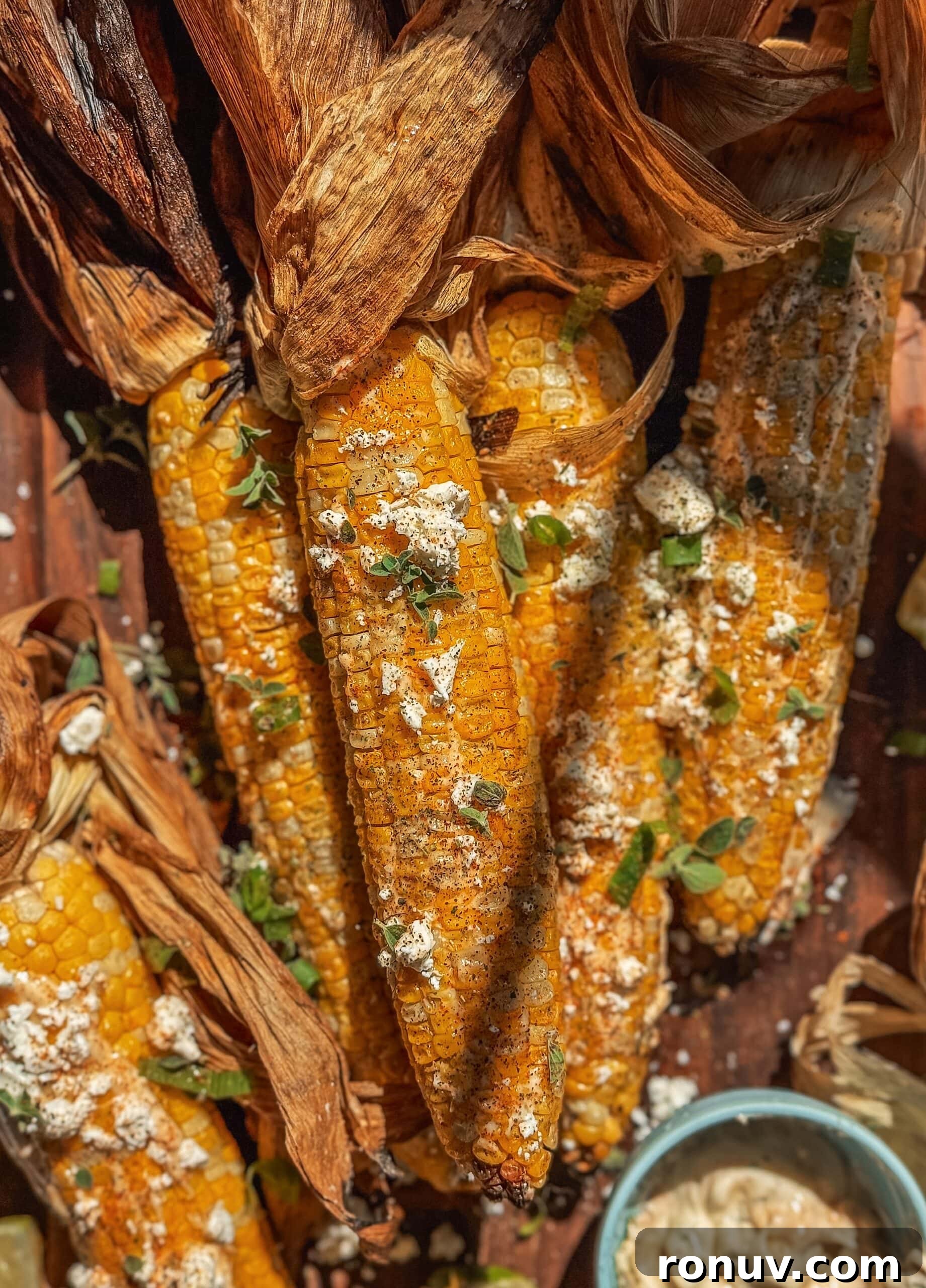 How to Grill Corn on the Cob for Smoky, Charred Flavor 2 Grilled Corn on the Cob
