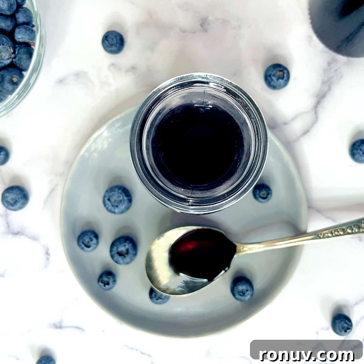 blueberry simple syrup in a jar.
