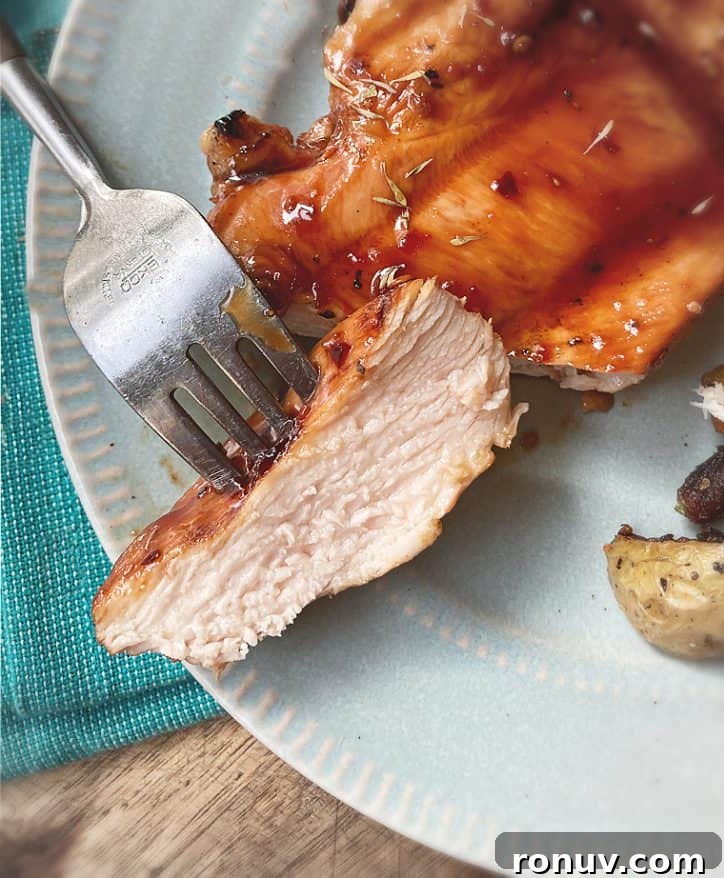 Cheerwine Glazed Sweet Heat Chicken Recipe 3 chicken on a fork