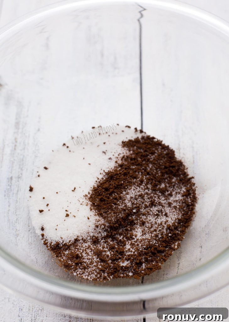 Dalgona Coffee Recipe: Whipped Coffee at Home 4 Equal amounts of instant coffee and sugar in a glass bowl.