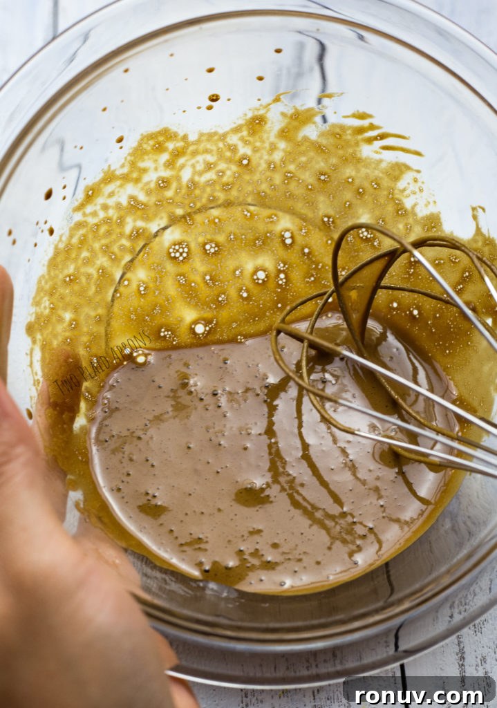 Dalgona Coffee Recipe: Whipped Coffee at Home 7 Mid stage whipping of coffee mixture.