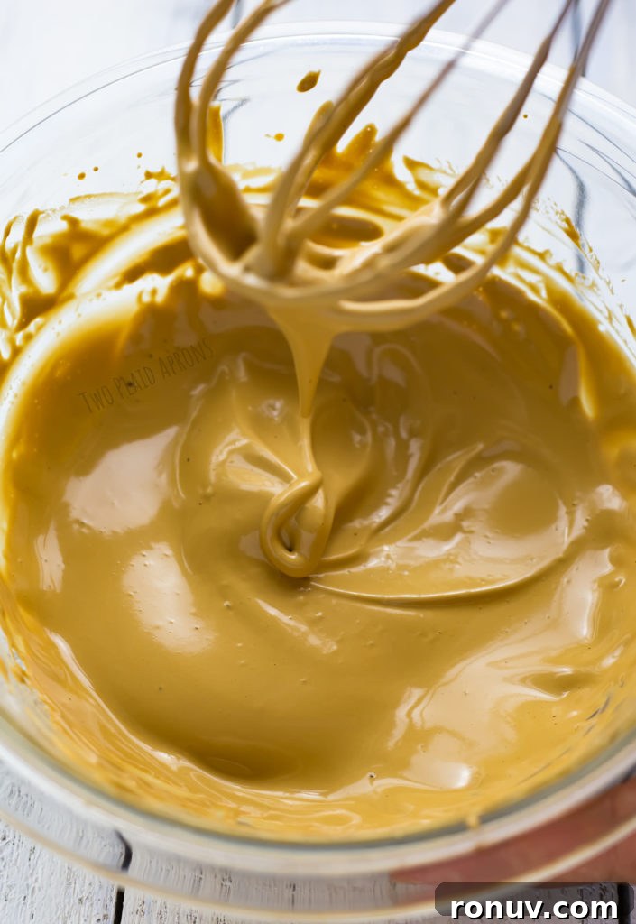 Dalgona Coffee Recipe: Whipped Coffee at Home 8 Coffee mixture whipped till ribbon stage.