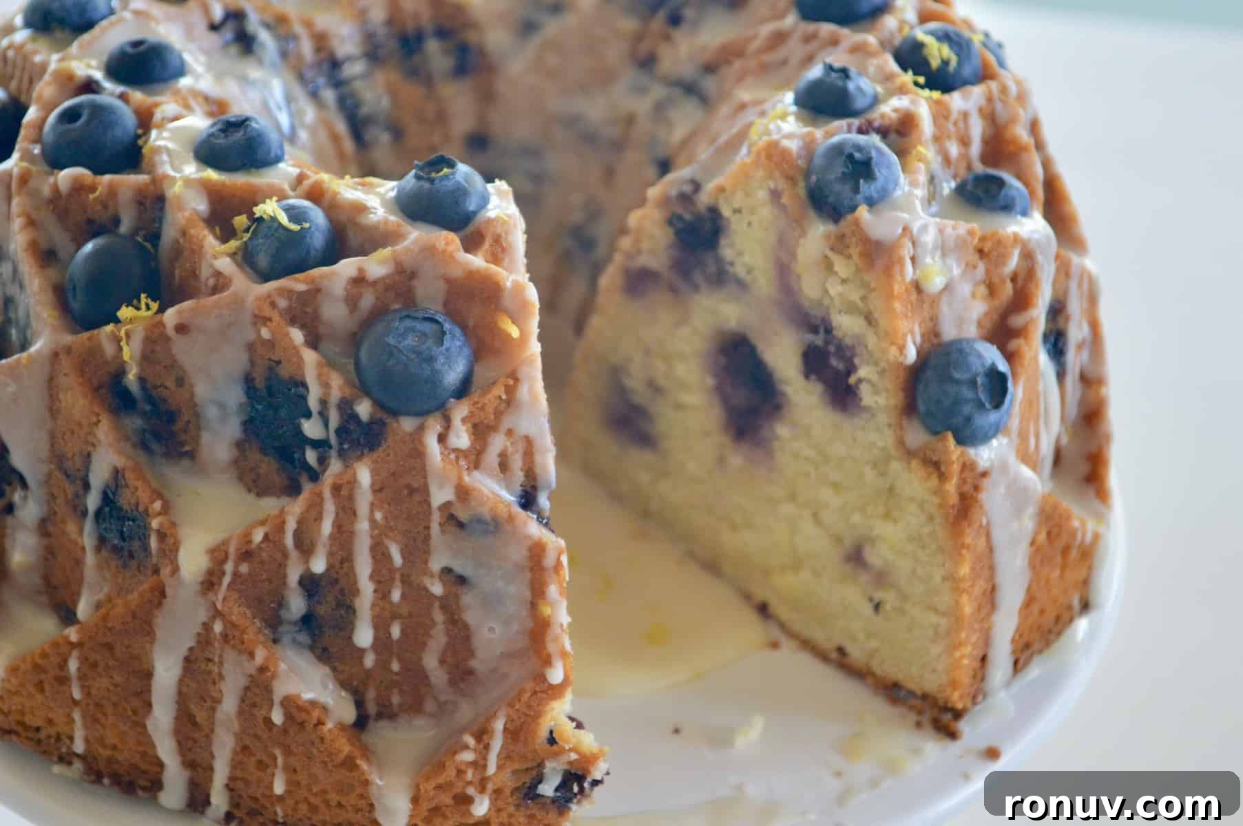 Make-Ahead Baby Shower Recipes and Party Food Ideas 12 Blueberry Lemon Bundt Cake with honey lemon glaze.
