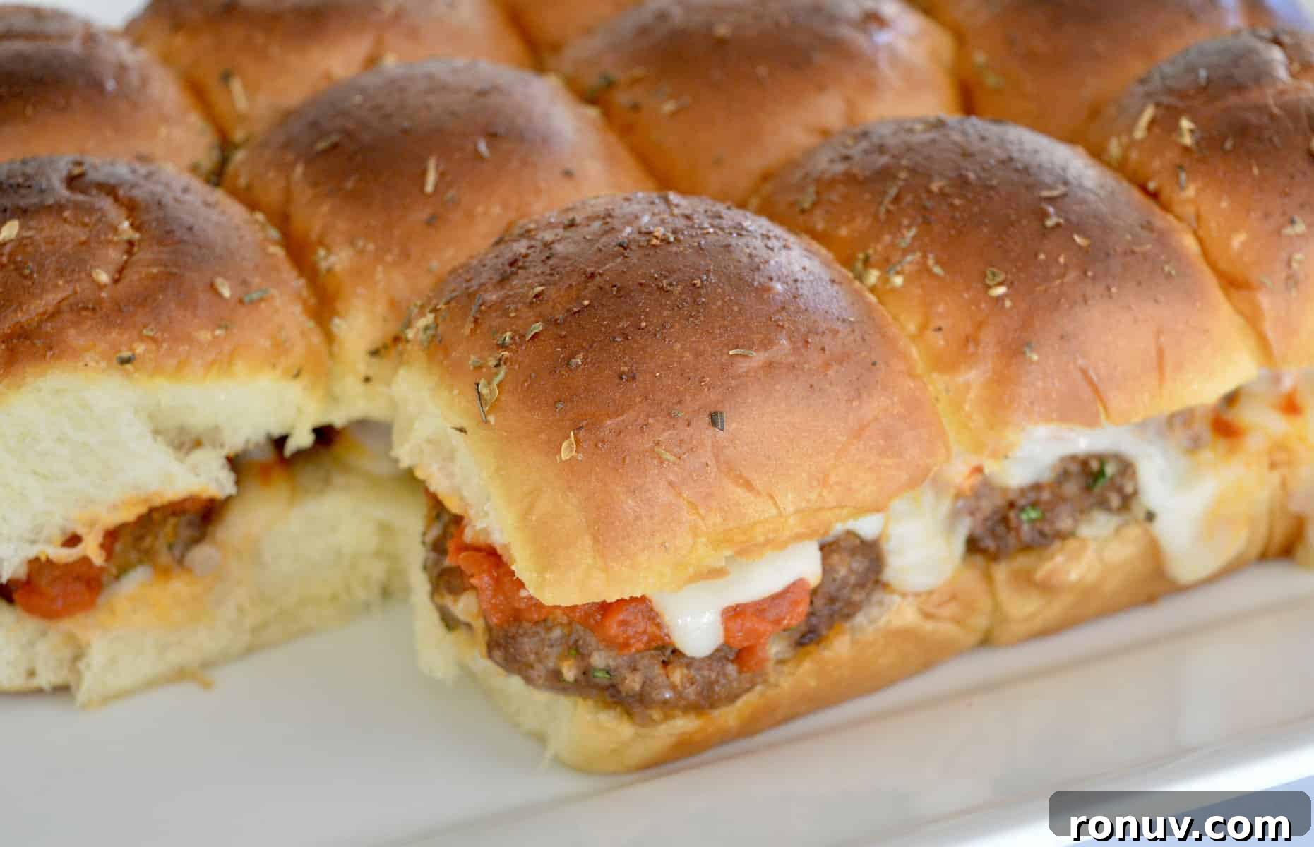 Make-Ahead Baby Shower Recipes and Party Food Ideas 17 Mini baked meatball sandwiches.