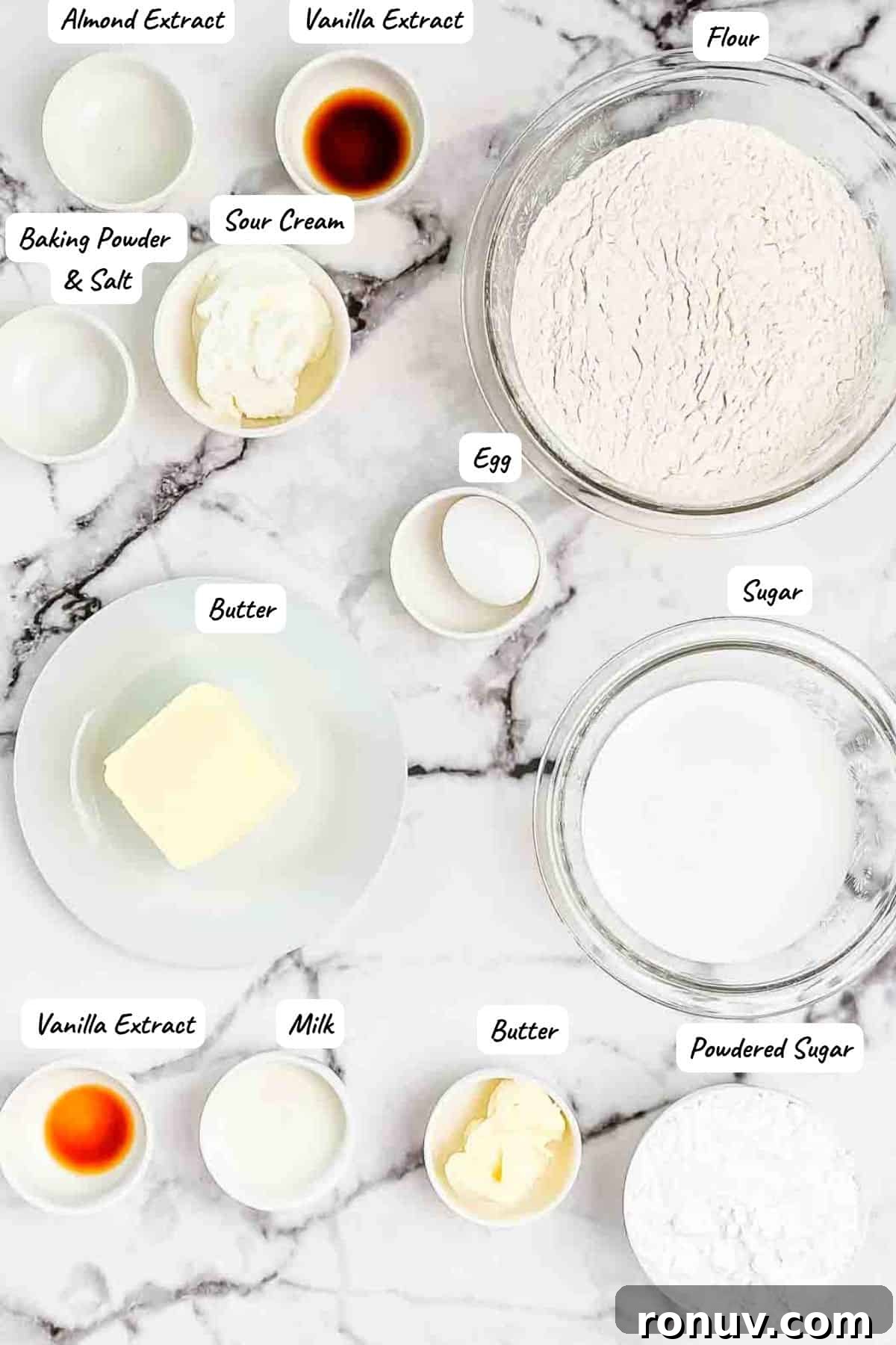 Air Fryer Sugar Cookies Recipe: Soft, Quick Homemade Treat 3 The ingredients for air fryer sugar cookies measured out and placed on a white countertop.