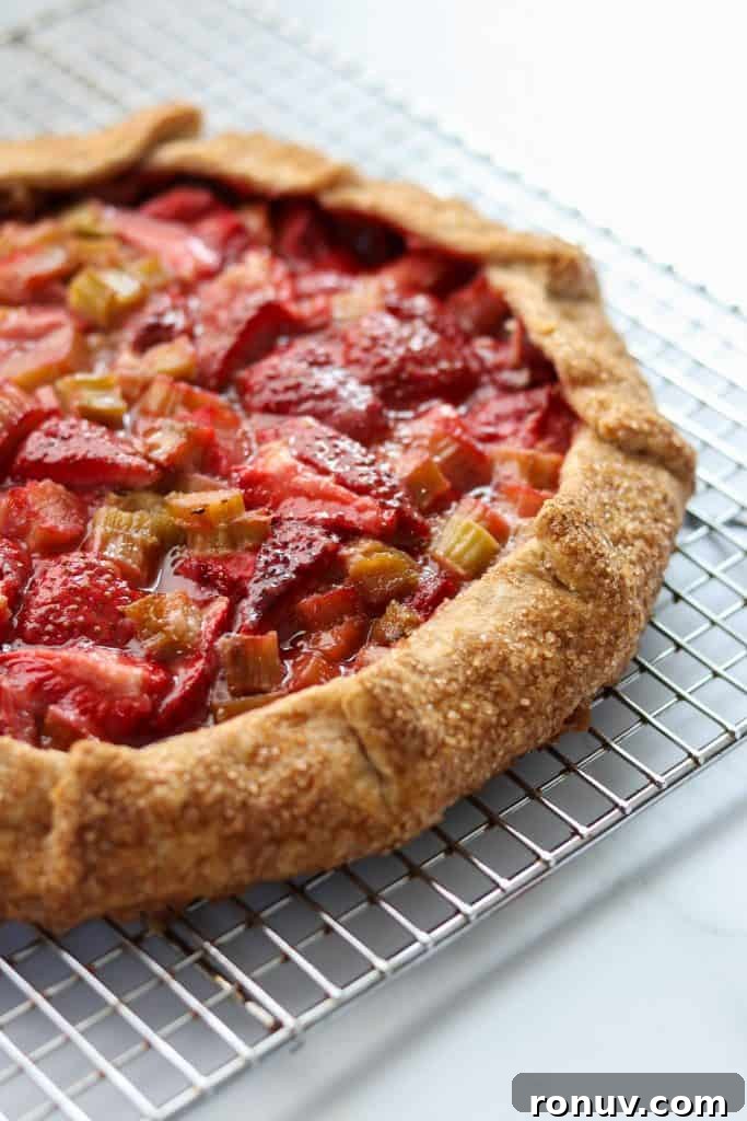 Rustic Strawberry Rhubarb Galette with Rye Crust 8 Strawberry rhubarb galette on a cooling rack