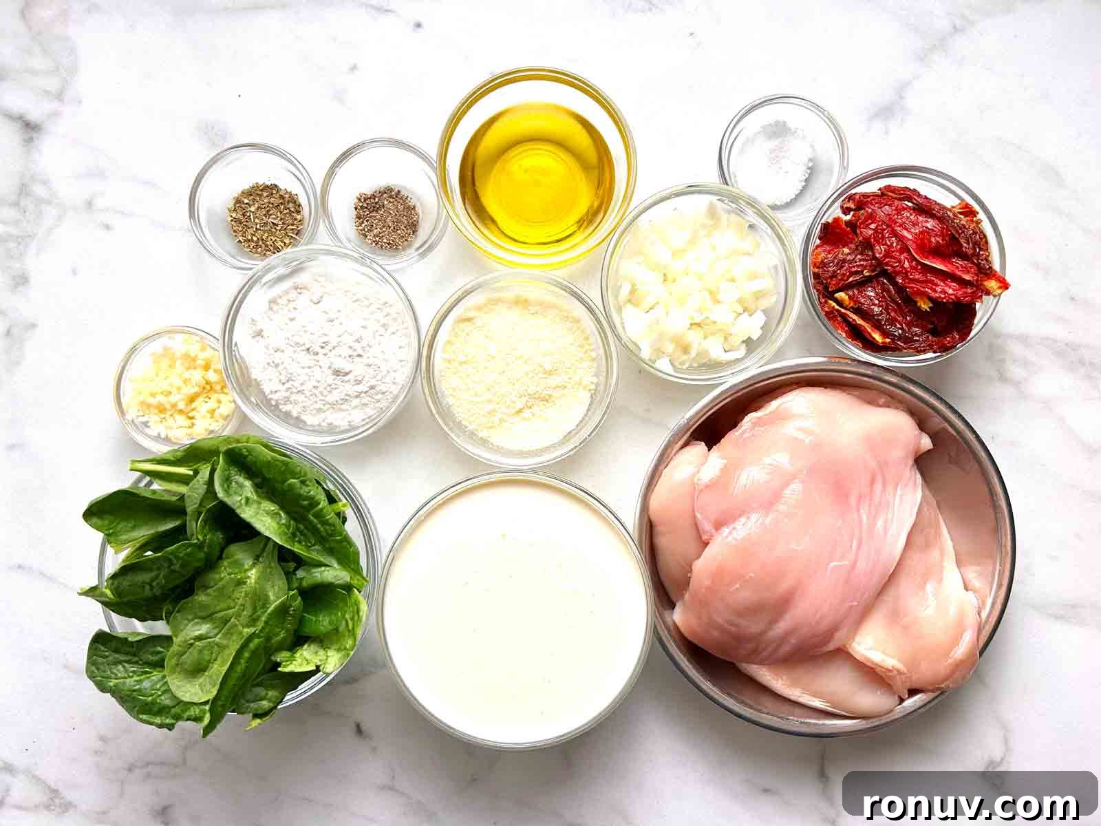 Creamy Tuscan Chicken Recipe with Spinach and Sun Dried Tomatoes 3 ingredients prepped in bowls.