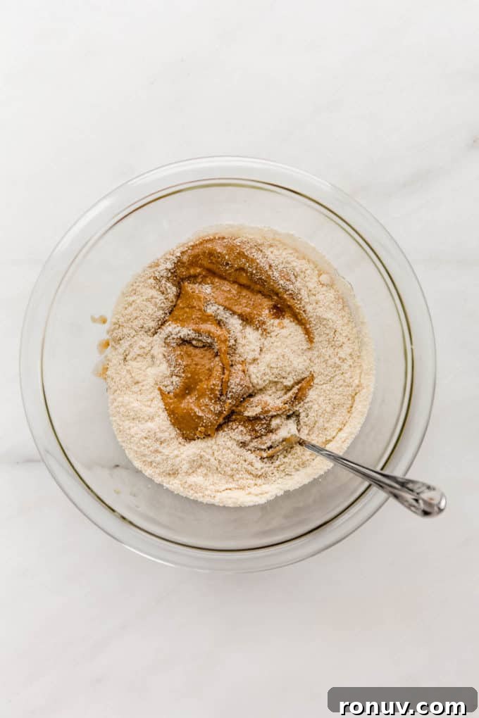Chewy Vegan Peanut Butter Cookies Recipe 3 almond flour and peanut butter in a mixing bowl