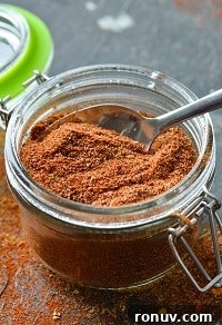 Homemade Salt-Free Fajita Seasoning Recipe 8 homemade fajita seasoning in a small glass jar with a spoon