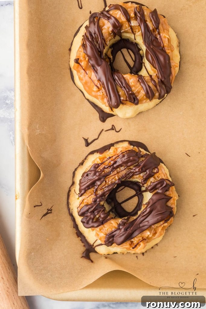 Copycat Samoa Cookies: Homemade Samoas with Caramel and Coconut 8 Homemade Samoa Cookies are a copycat version of everyone's favorite Girl Scout Cookie! These big, thick, and buttery shortbread cookies melt in your mouth and are packed with chocolate, caramel, and coconut.