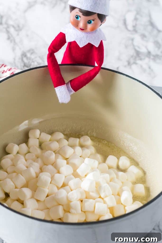 Elf on the Shelf Rice Krispie Treat Recipe for Christmas 7 elf on the shelf next to bowl of marshmallows