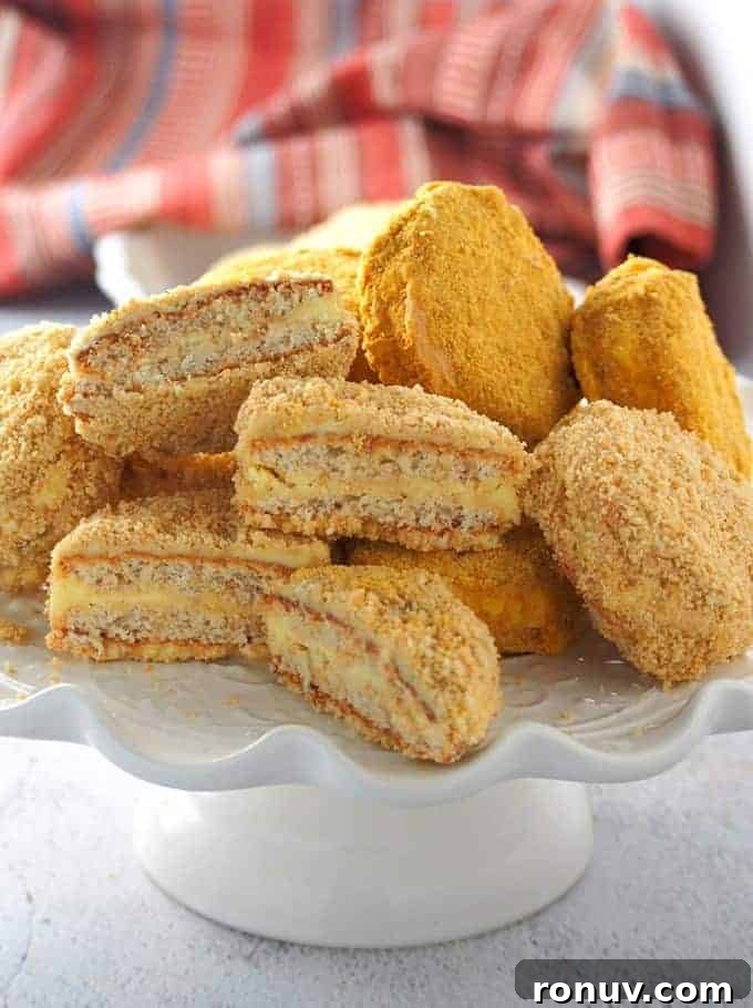 Silvanas: Filipino Frozen Buttercream Cookie Recipe 9 cut silvanas on a white cake platter