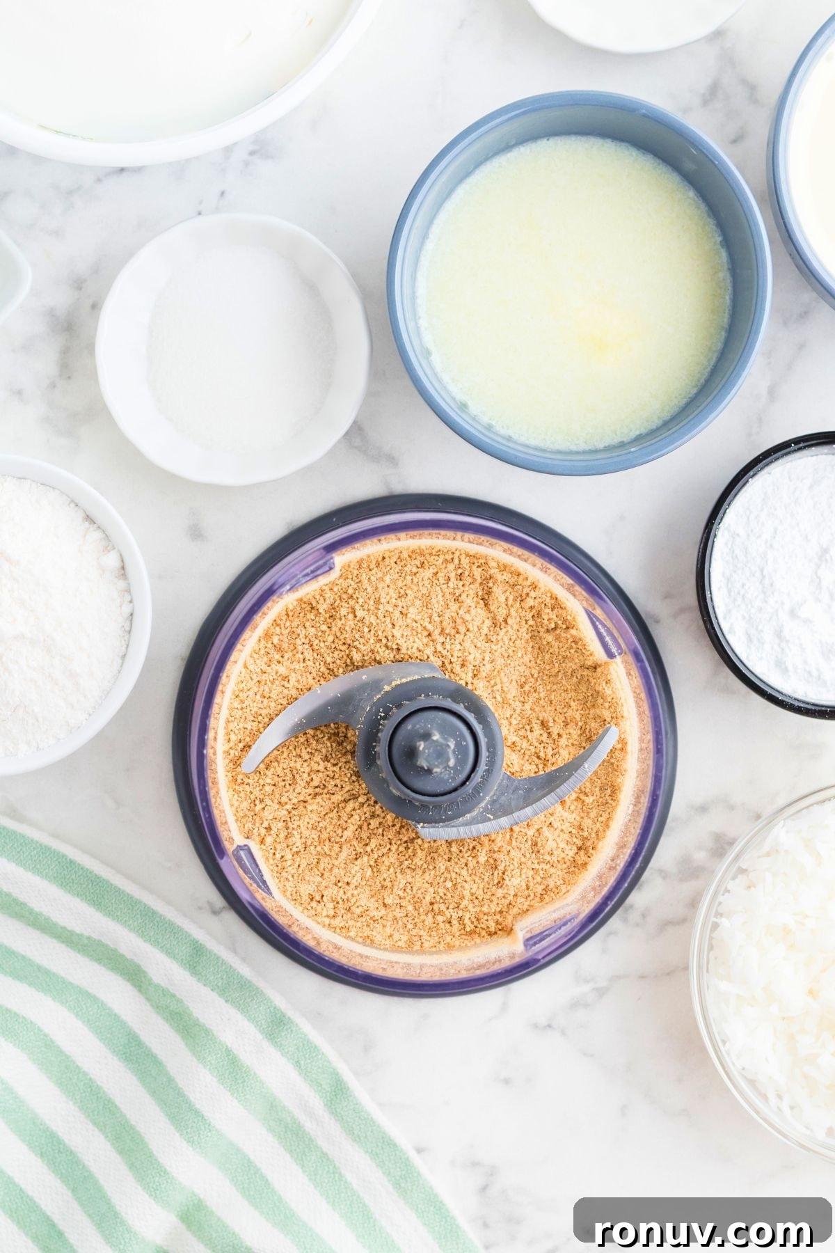 Homemade Coconut Delight Dessert Recipe 4 Graham crackers crushed in a food processor.