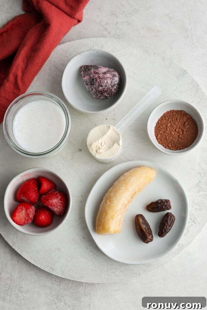 Creamy Red Velvet Protein Shake Recipe 3 Red Velvet Protein Shake ingredients on white wooden board by Flora & Vino