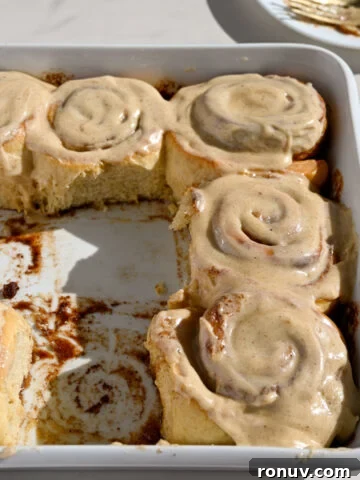 Delicious brown butter cinnamon rolls in a pan.