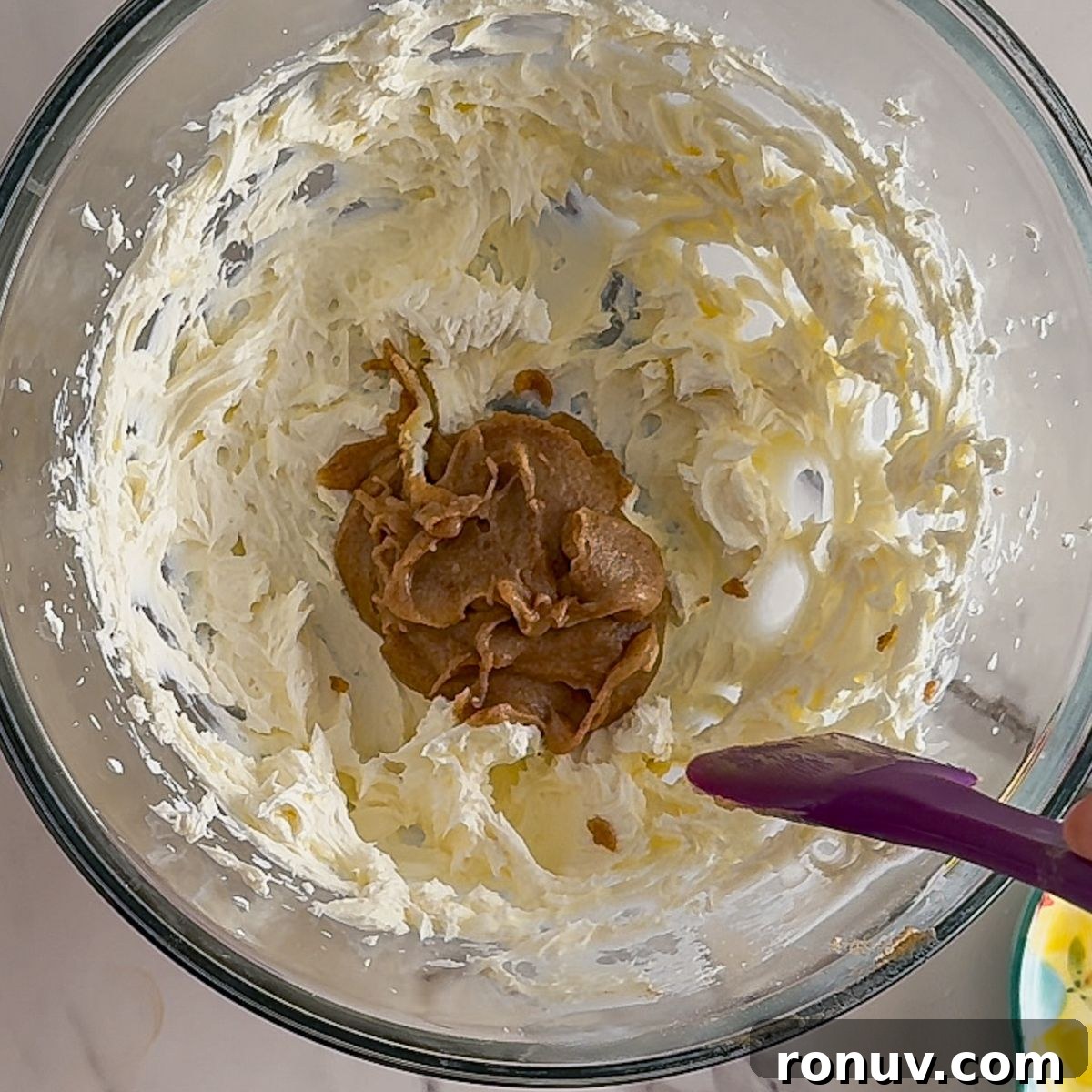 Adding in the brown butter.