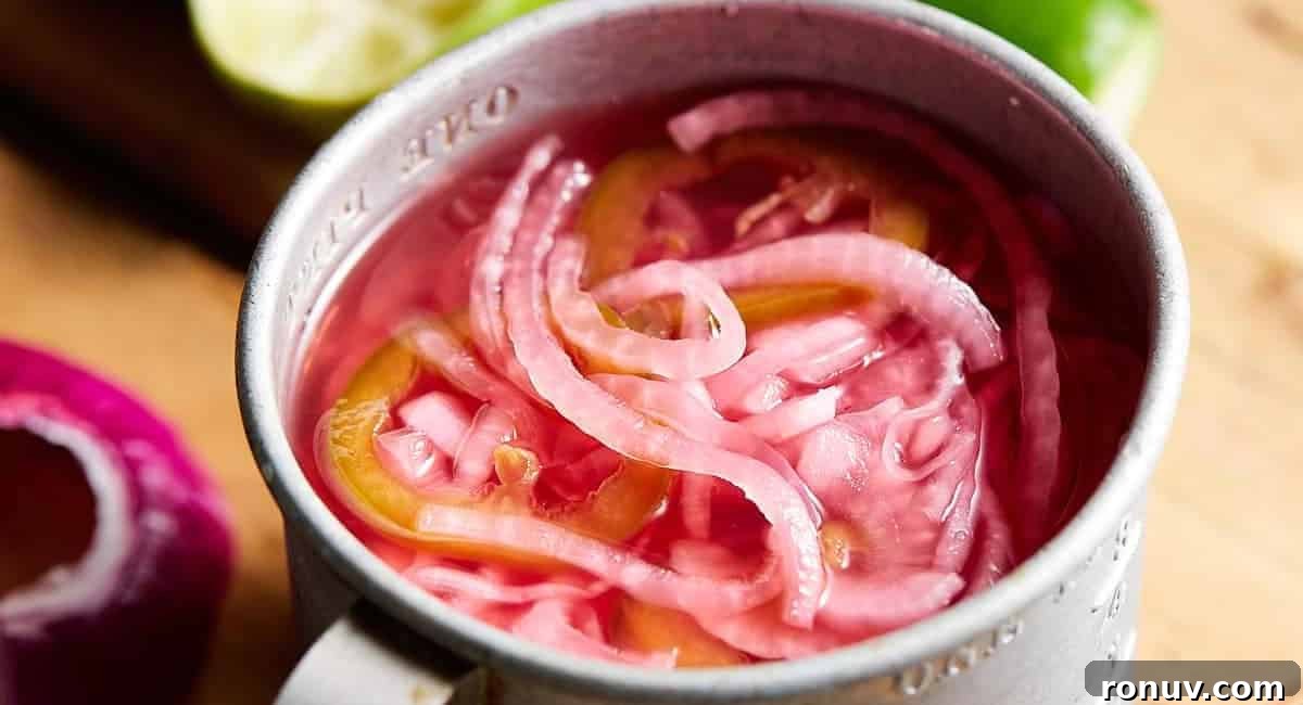 What to Serve with Taco Soup: 20 Toppings and Sides 3 Overhead up close image of Mexican pickled onions in silver cup.